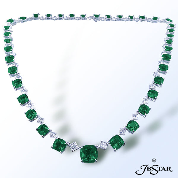 JB STAR A CAPTIVATING DISPLAY OF 28.52 CT. TW. CUSHION CUT EMERALDS ARE BLENDING WITH SPARKLING 3.76