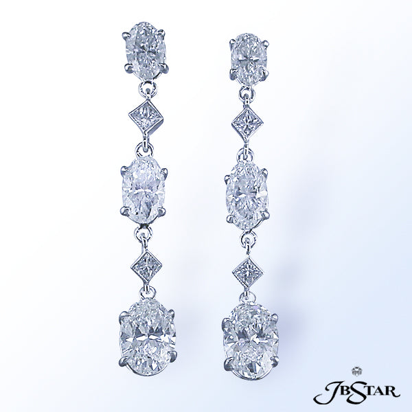 JB STAR THESE GRACEFUL AND ELABORATE PLATINUM DIAMOND EARRINGS FEATURE TWO 2.48 CT. TW. OVAL SHAPE D