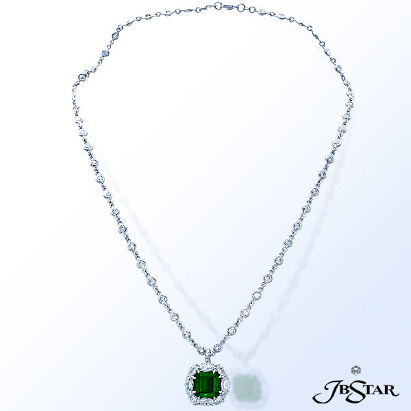 JB STAR A BEAUTIFUL EMERALD-CUT EMERALD PENDANT EMBRACED BY MARQUISE AND PEAR-SHAPE DIAMONDS; HANDCR
