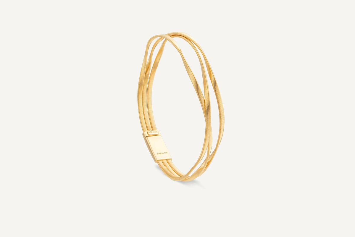 18K YELLOW GOLD 3-STRAND COIL BRACELET FROM THE MARRAKECH