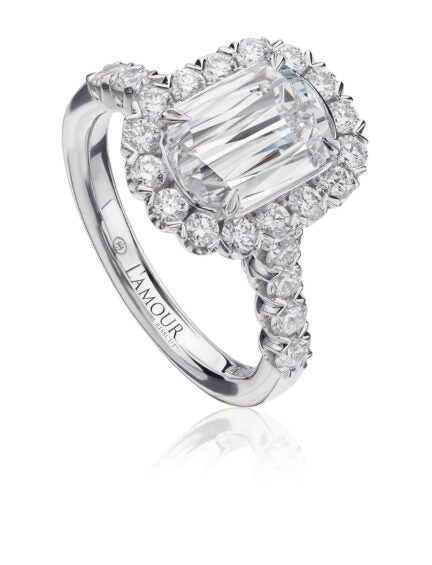 18KW ENGAGEMENT RING WITH HALO AND ROUND CUT DIAMONDS. CENTER DIAMOND 1.22CT