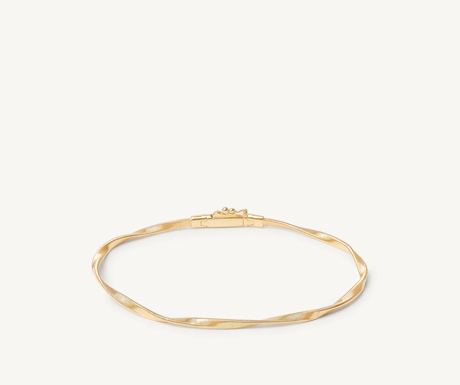 18K YELLOW GOLD TWISTED COIL BRACELET FROM THE MARRAKECH COLLECTION