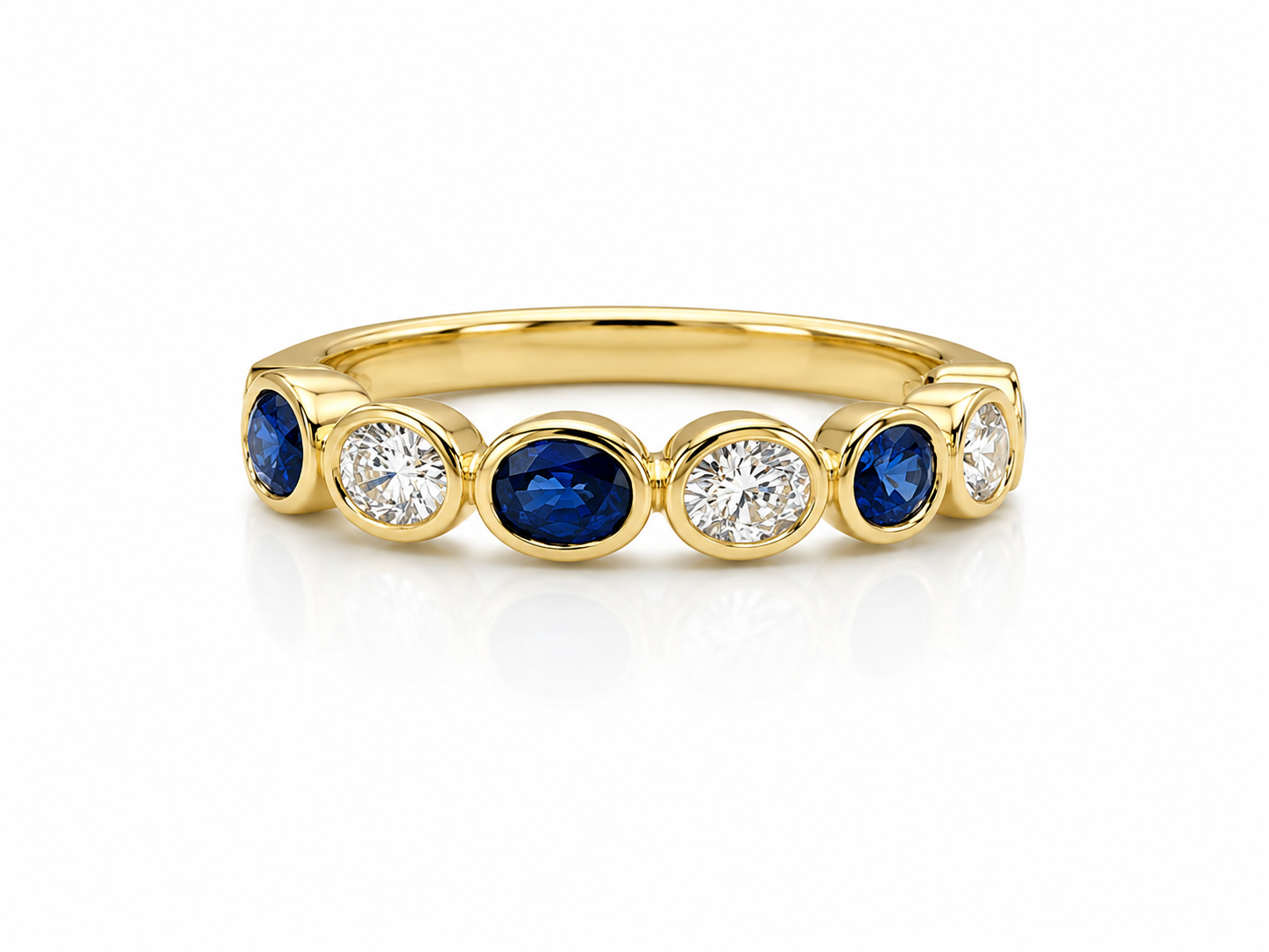 18K GOLD OVAL SAPPHIRE AND DIAMOND BEZEL BAND