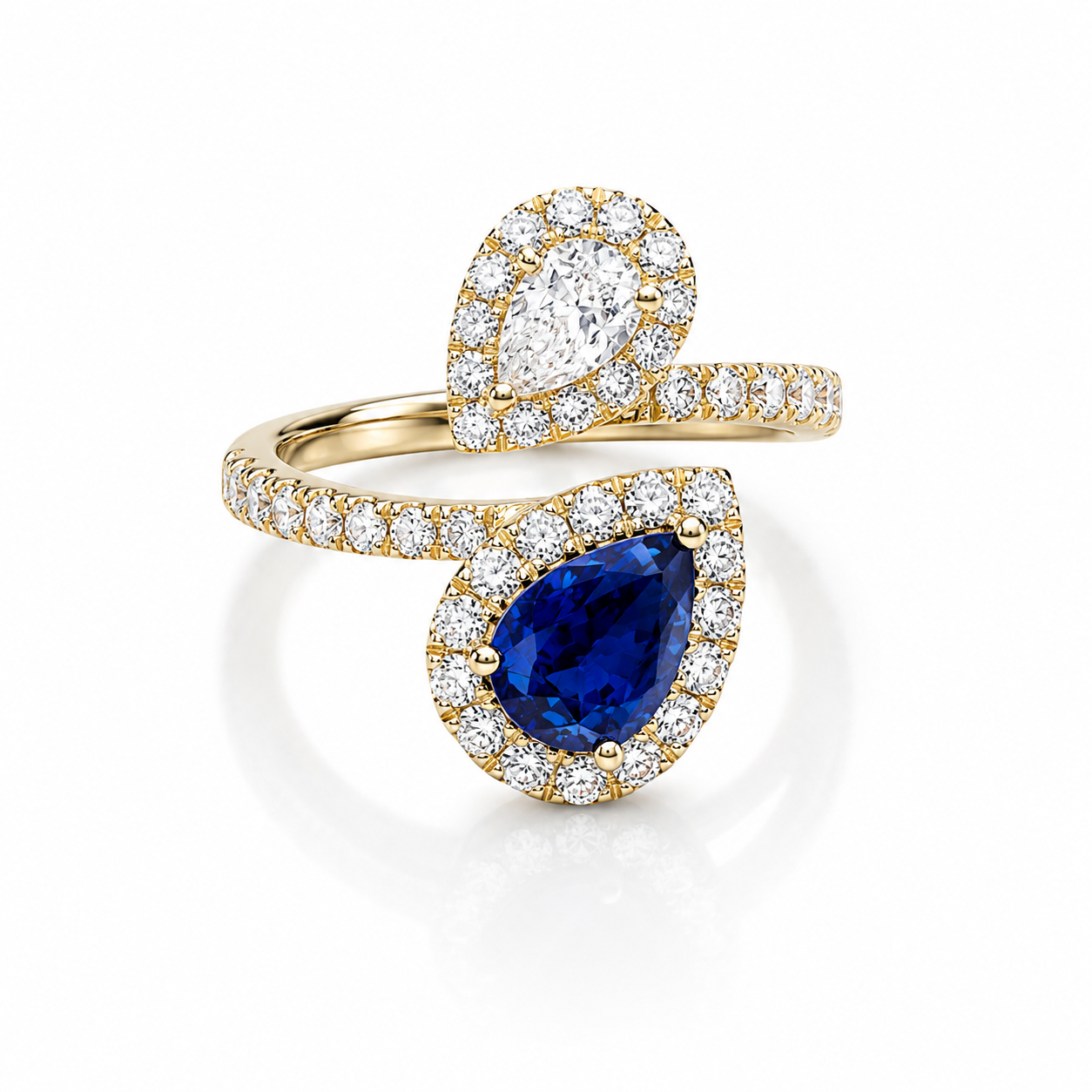 18K YELLOW GOLD BLUE SAPPHIRE AND DIAMOND BYPASS RING