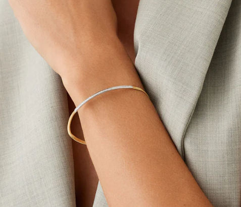 18k YELLOW AND WHITE GOLD TWISTED COIL BRACELET WITH 0.17CT OF DIAMONDS FROM THE MARRAKECH COLLECTION