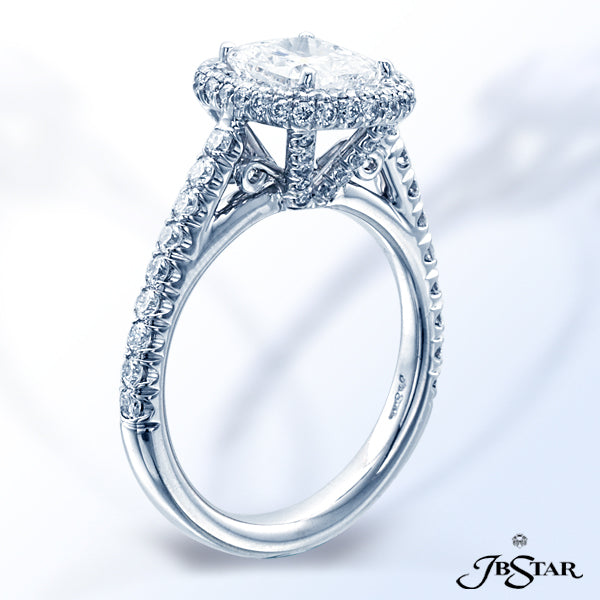 JB STAR GORGEOUS CUSHION DIAMOND ENGAGEMENT RING ENHANCED BY MICRO PAVE AND HANDCRAFTED IN PLATINUM.
