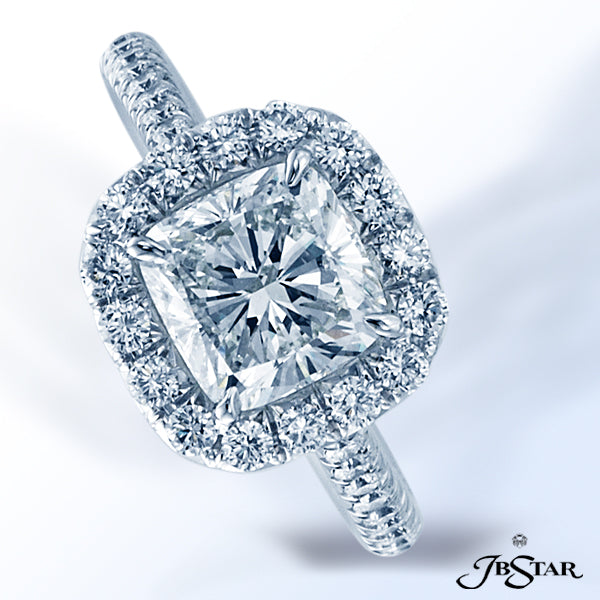 JB STAR GORGEOUS CUSHION DIAMOND ENGAGEMENT RING ENHANCED BY MICRO PAVE AND HANDCRAFTED IN PLATINUM.
