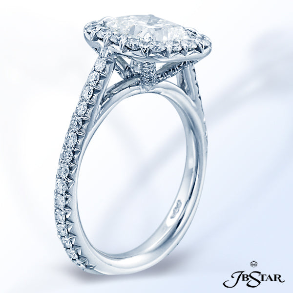 JB STAR GORGEOUS CUSHION DIAMOND ENGAGEMENT RING ENHANCED BY MICRO PAVE AND HANDCRAFTED IN PLATINUM.