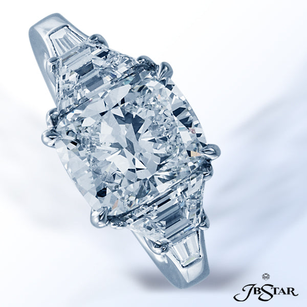 JB STAR DIAMOND ENGAGEMENT RING FEATURING A STUNNING 3.02 CT CUSHION DIAMOND NESTLED IN BETWEEN TRAP
