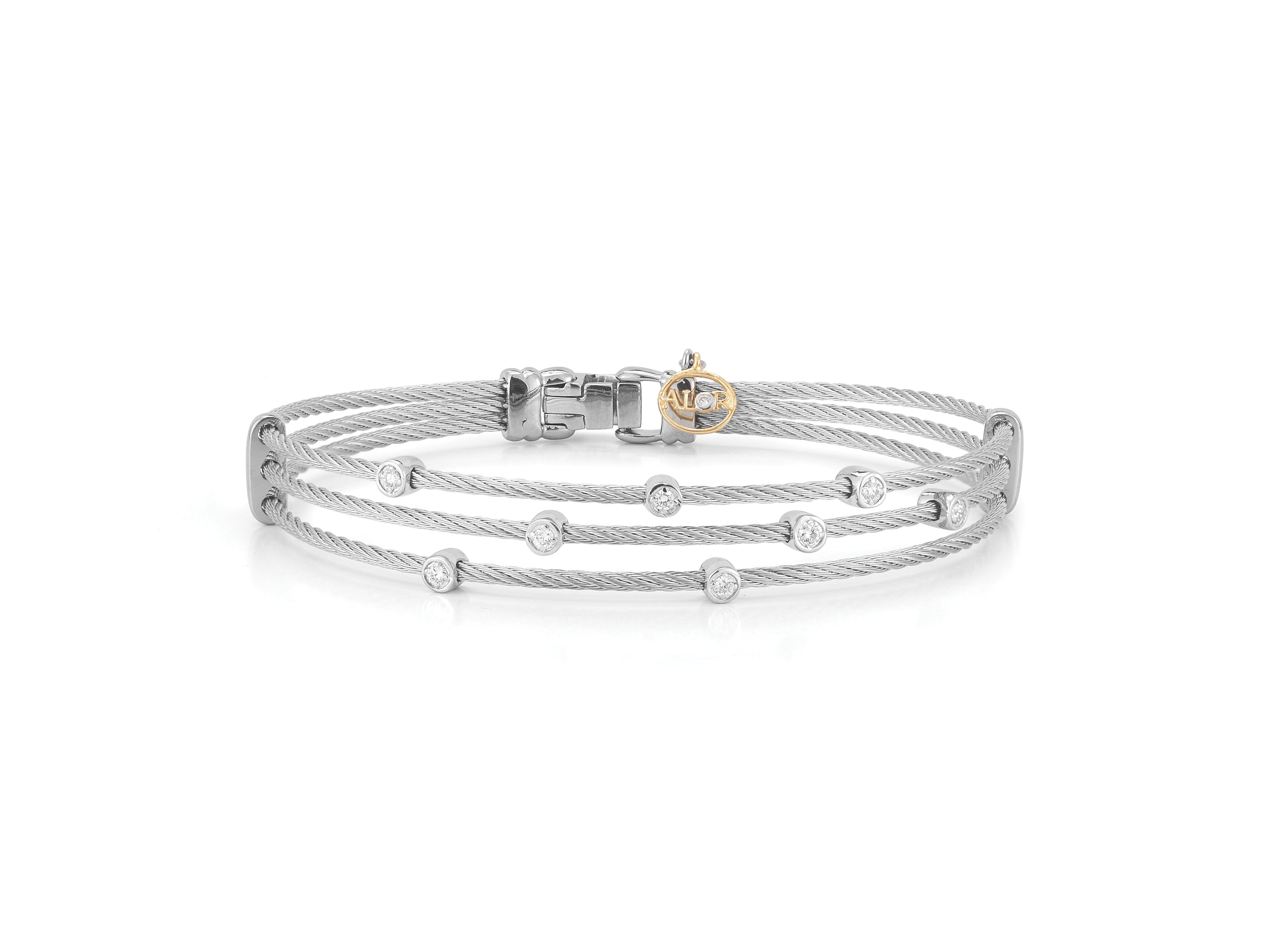 Alor Grey cable, 18 karat White Gold, 0.18 total carat weight Diamonds and stainless steel. Imported.