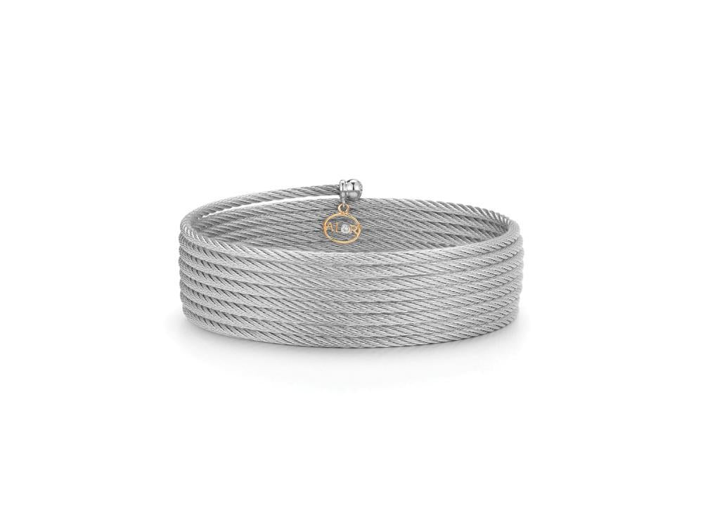 Alor Grey cable wrap, 18 karat Yellow Gold, 0.01 total carat weight Diamonds and stainless steel. Imported.