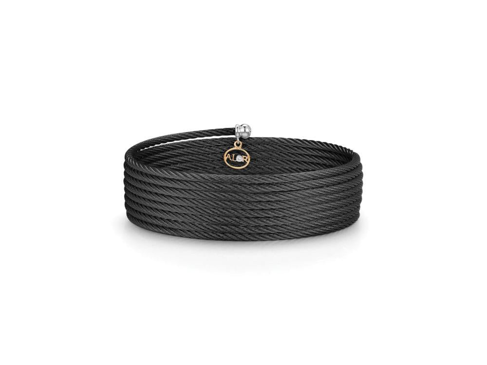 Alor Black cable wrap, 18 karat Yellow Gold, 0.01 total carat weight Diamonds and stainless steel. Imported.