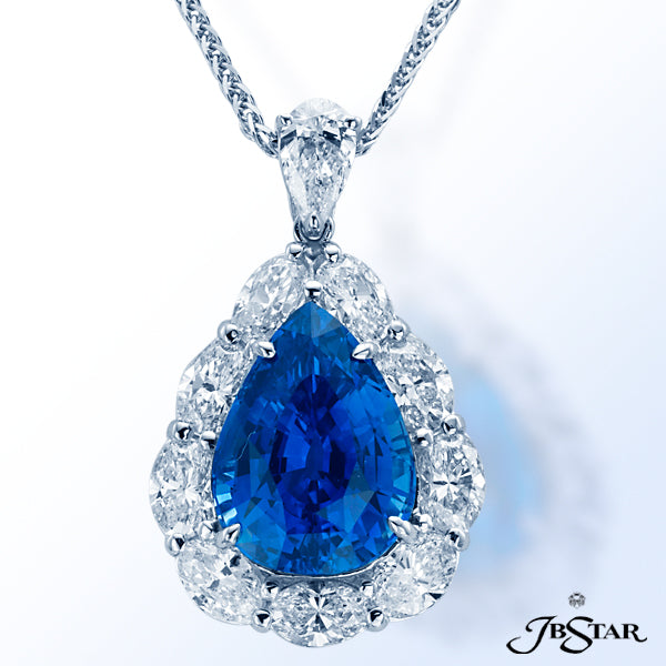 JB STAR SAPPHIRE PENDANT FEATURING A BEAUTIFUL 7.23 CT PEAR SHAPE BLUE SAPPHIRE ENCIRCLED BY OVAL DI