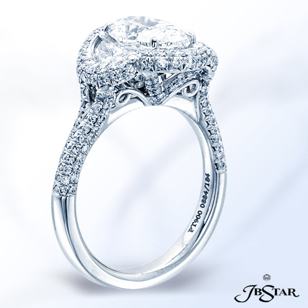 JB STAR PLATINUM DIAMOND RING FEATURING A 2.03 CT OVAL DIAMOND EMBRACED BY HALF MOON DIAMONDS IN A P