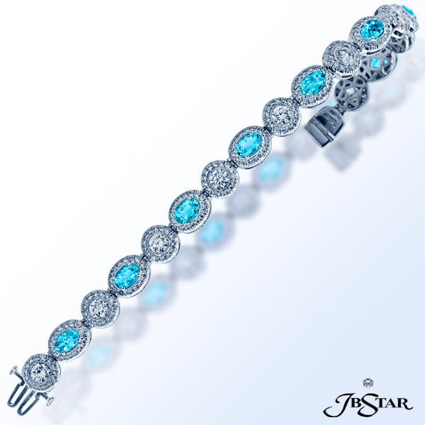JB STAR A STUNNING PARAIBA AND DIAMOND BRACELET WITH ALTERNATING OVAL PARAIBAS AND ROUND DIAMONDS, E