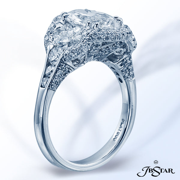 JB STAR PLATINUM DIAMOND RING WITH A GORGEOUS 2.23 CT OVAL DIAMOND EMBRACED BY ADDITIONAL OVAL AND R