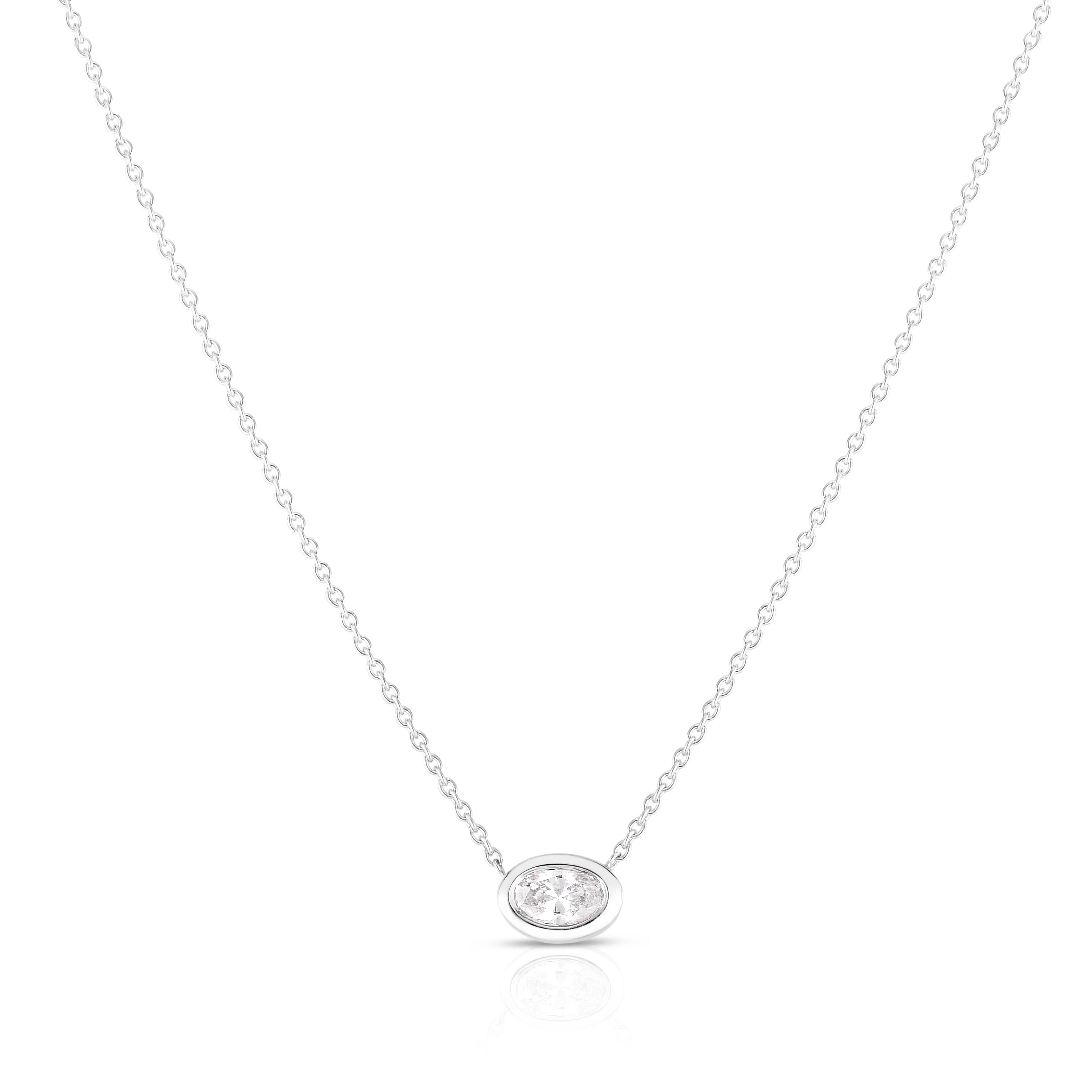 18K WHITE GOLD PENDANT WITH .20CT OVAL DIAMOND