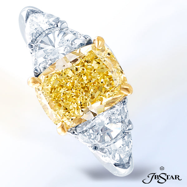 JB STAR FANCY INTENSE YELLOW DIAMOND IN A CLASSICALLY DESIGNED RING WITH A 2.51 CT FANCY INTENSE YEL