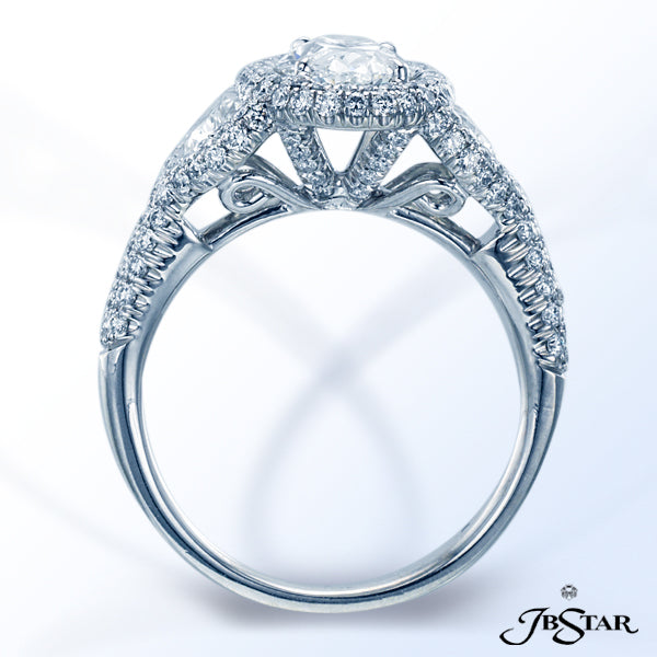 JB STAR PLATINUM DIAMOND RING FEATURING A STUNNING 1.42 CT OVAL DIAMOND EMBRACED BY TWO HALF MOON DI