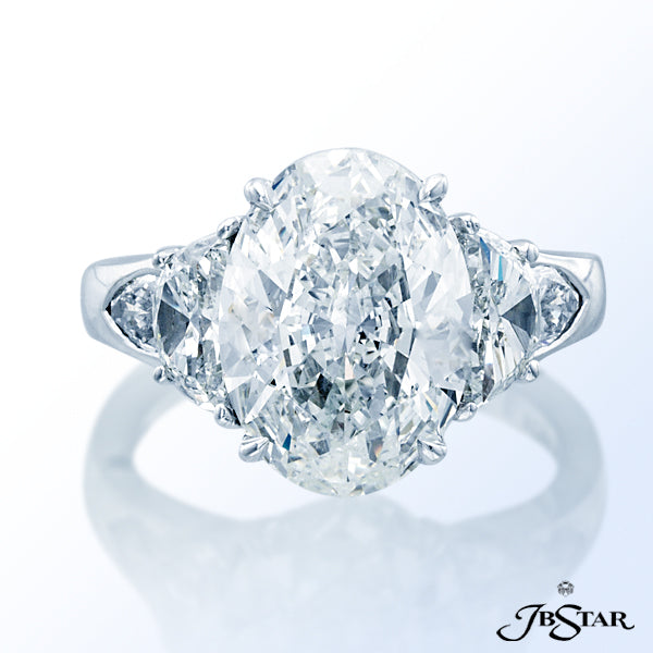 JB STAR PLATINUM ENGAGEMENT RING IS CLASSICALLY DESIGNED AND FEATURES A STUNNING 5.01CT OVAL DIAMOND