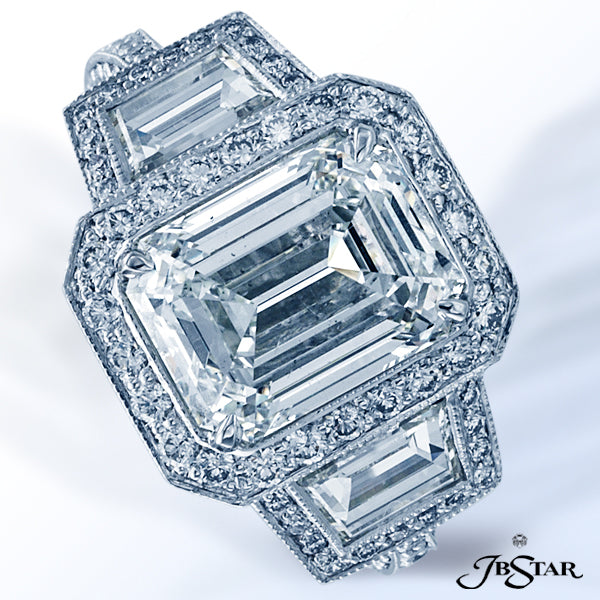 JB STAR BEAUTIFULLY HANDCRAFTED DIAMOND RING FEATURING A 4.01CT EMERALD-CUT DIAMOND CENTER EMBRACED
