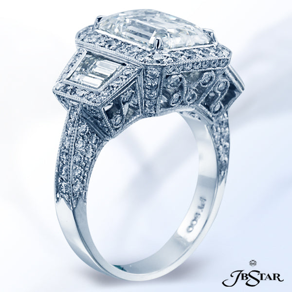 JB STAR BEAUTIFULLY HANDCRAFTED DIAMOND RING FEATURING A 4.01CT EMERALD-CUT DIAMOND CENTER EMBRACED