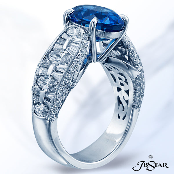JB STAR SAPPHIRE AND DIAMOND RING FEATURING A GORGEOUS CERTIFIED 4.78 CT OVAL BLUE SAPPHIRE IN A SET