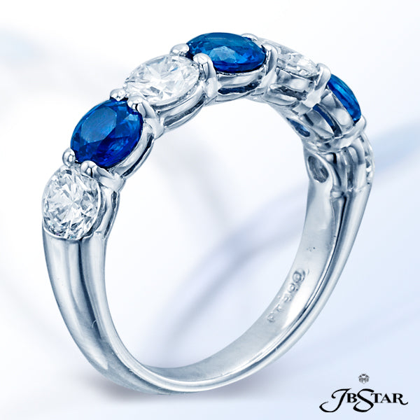 JB STAR BLUE SAPPHIRE AND DIAMOND BAND HANDCRAFTED IN A 7-STONE STYLE, WITH ALTERNATING ROUND BLUE S