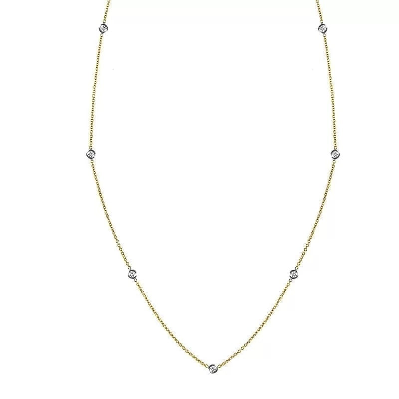 18K WHITE AND YELLOW GOLD 7 DIAMOND STATION NECKLACE .35CT