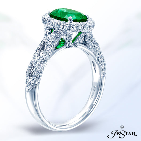 JB STAR EMERALD AND DIAMOND RING FEATURES A MAGNIFICENT 1.54CT OVAL EMERALD CENTER IN A MICRO PAVE H