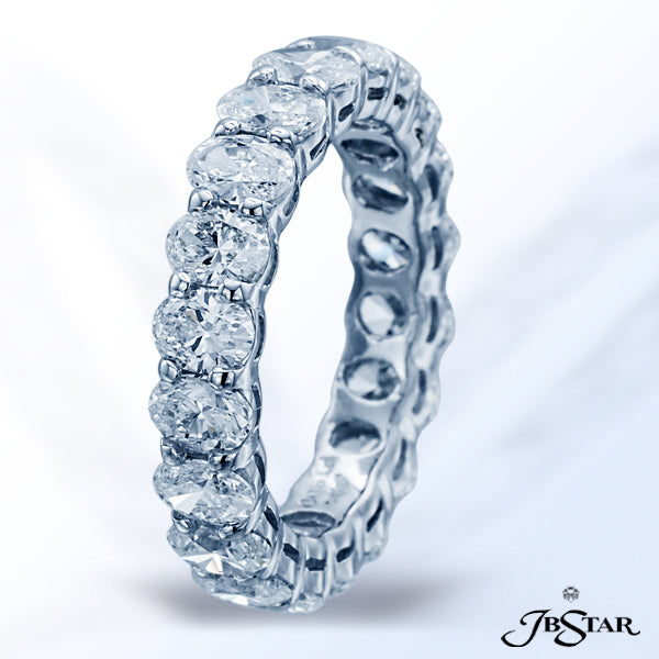 JB STAR PLATINUM DIAMOND ETERNITY BAND WITH 20 CAREFULLY MATCHED OVAL DIAMONDS IN A SHARED PRONG SET