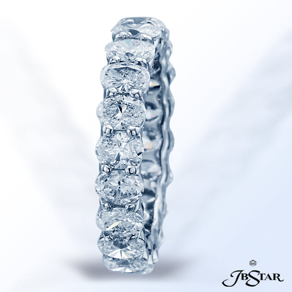 JB STAR PLATINUM DIAMOND ETERNITY BAND WITH 20 CAREFULLY MATCHED OVAL DIAMONDS IN A SHARED PRONG SET