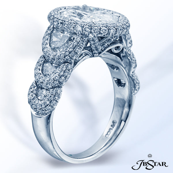 JB STAR PLATINUM DIAMOND RING HANDCRAFTED WITH A 2.17 OVAL DIAMOND CENTER ENHANCED BY CAREFULLY MATC