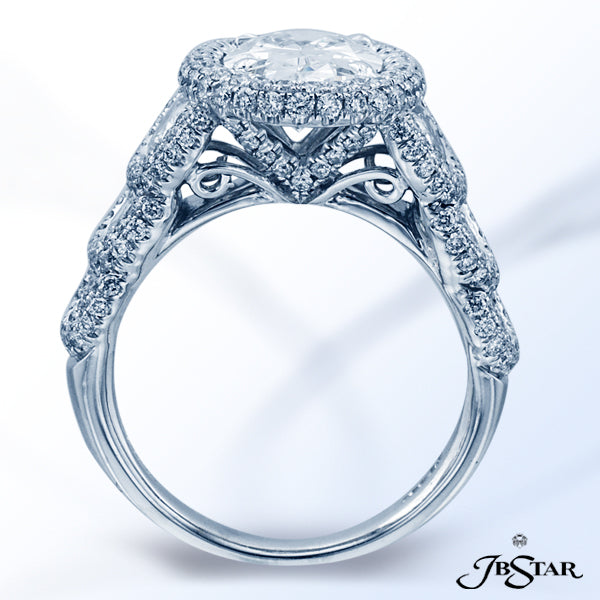 JB STAR PLATINUM DIAMOND RING HANDCRAFTED WITH A 2.17 OVAL DIAMOND CENTER ENHANCED BY CAREFULLY MATC