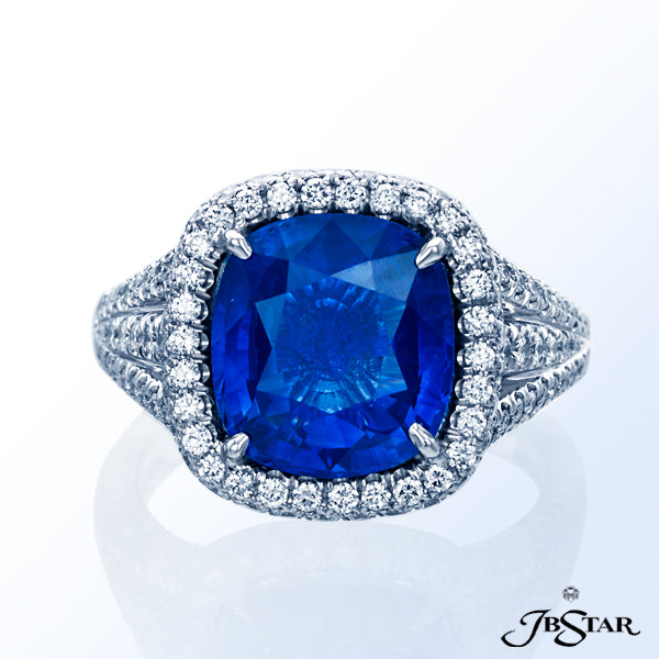 JB STAR PLATINUM RING FEATURING A BEAUTIFUL 5.13 CT CUSHION SAPPHIRE IN A MICRO PAVE HALO SETTING WI