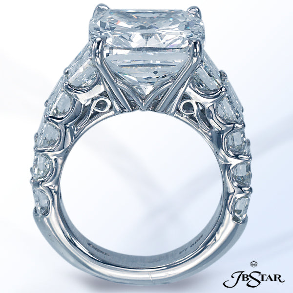 JB STAR DIAMOND RING FEATURING AN AMAZING 10.40 CT CUSHION DIAMOND EMBRACED BY TRAPEZOID DIAMONDS AN
