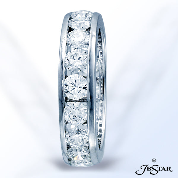 JB STAR PLATINUM DIAMOND ETERNITY BAND HANDCRAFTED WITH 18 ROUND DIAMONDS IN A CHANNEL SETTING.DIA