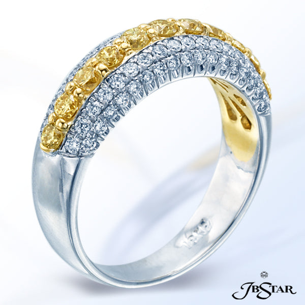 JB STAR CENTER ROW OF 11 CAREFULLY MATCHED NATURAL FANCY YELLOW ROUND DIAMONDS IN SHARED-PRONG SETTI