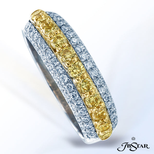 JB STAR CENTER ROW OF 11 CAREFULLY MATCHED NATURAL FANCY YELLOW ROUND DIAMONDS IN SHARED-PRONG SETTI