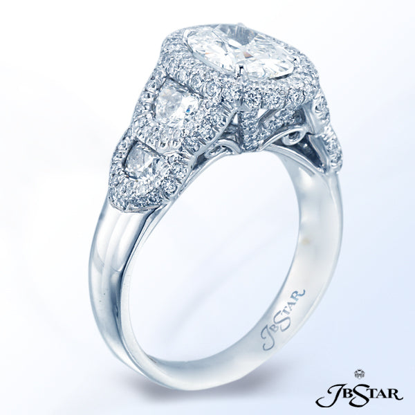 JB STAR HANDCRAFTED PLATINUM AND DIAMOND RING FEATURING A 1.52CT OVAL DIAMOND WITH HALF MOON DIAMOND