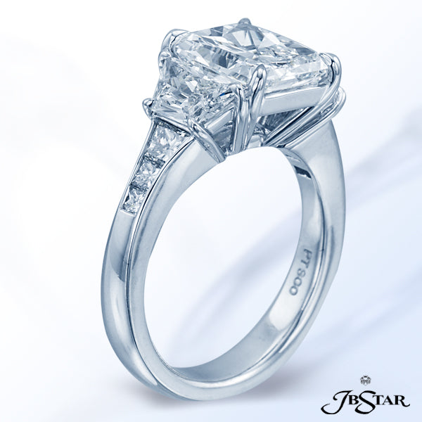 JB STAR PLATINUM DIAMOND RING FEATURING A MAGNIFICENT 3.25 CT RADIANT DIAMOND EMBRACED BY TRAPEZOID