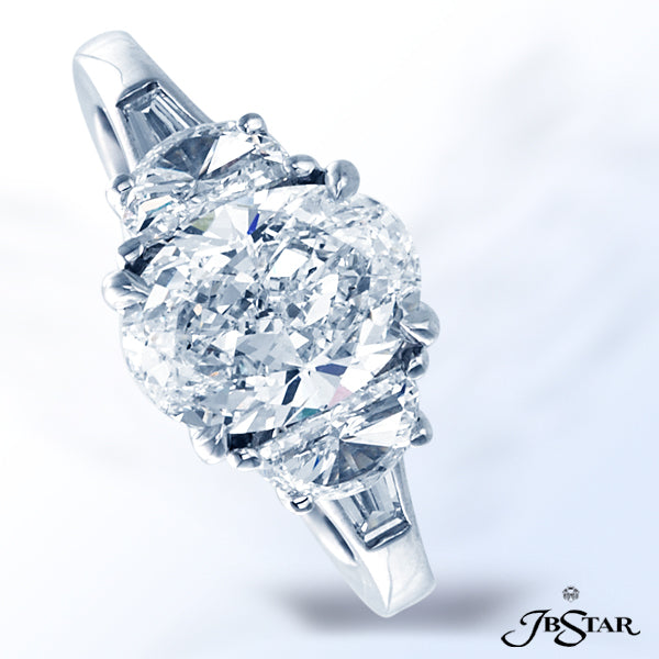 JB STAR GORGEOUS DIAMOND PLATINUM RING FEATURING A MAGNIFICENT 2.03 CT OVAL DIAMOND EMBRACED BY HALF