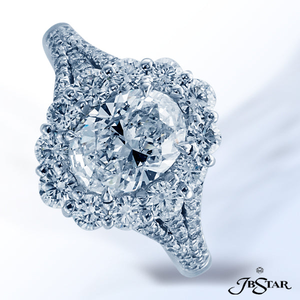 JB STAR DIAMOND ENGAGEMENT RING FEATURING A STUNNING 1.32 CT OVAL DIAMOND SET IN A PAVE HALO WITH A