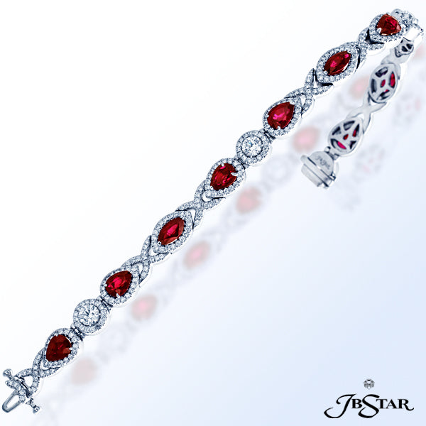 JB STAR BEAUTIFUL BRACELET FEATURING MARQUISE AND PEAR-SHAPE RUBIES WITH ROUND DIAMONDS LINKED TOGET