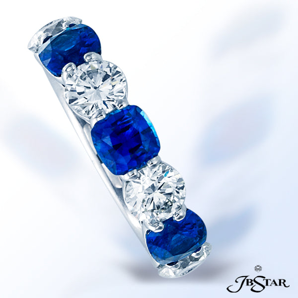 JB STAR BLUE SAPPHIRE AND DIAMOND BAND HANDCRAFTED IN A 7-STONE STYLE, WITH ALTERNATING CUSHION-CUT