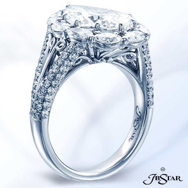 JB STAR STUNNING DIAMOND RING FEATURING A PEAR-SHAPE DIAMOND, ENCIRCLED BY PERFECTLY MATCHED MARQUIS