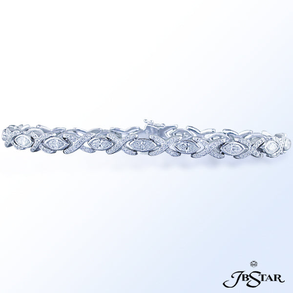 JB STAR HUGS AND KISSES DIAMOND BRACELET, HANDCRAFTED WITH BEZEL-SET MARQUISE DIAMOND "HUGS" AND DIA