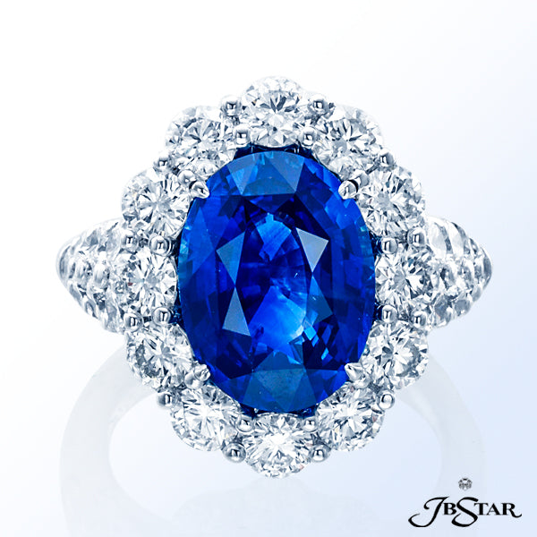 JB STAR HANDCRAFTED SAPPHIRE RING FEATURING A BEAUTIFUL 6.07 CT OVAL SAPPHIRE ENCIRCLED BY 12 PERFEC