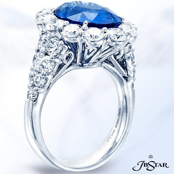 JB STAR HANDCRAFTED SAPPHIRE RING FEATURING A BEAUTIFUL 6.07 CT OVAL SAPPHIRE ENCIRCLED BY 12 PERFEC