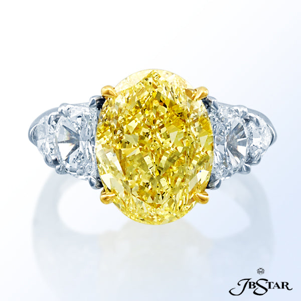 JB STAR NATURAL FANCY YELLOW DIAMOND RING FEATURING A MAGNIFICENT 5.05 CT OVAL FANCY INTENSE YELLOW